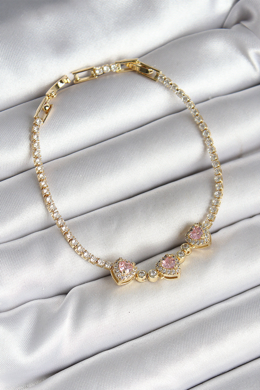 Pirinç Sıralı Pembe Kalp Figürlü Zirkon Taşlı Gold Renk Kadın Bileklik TG27BB6983