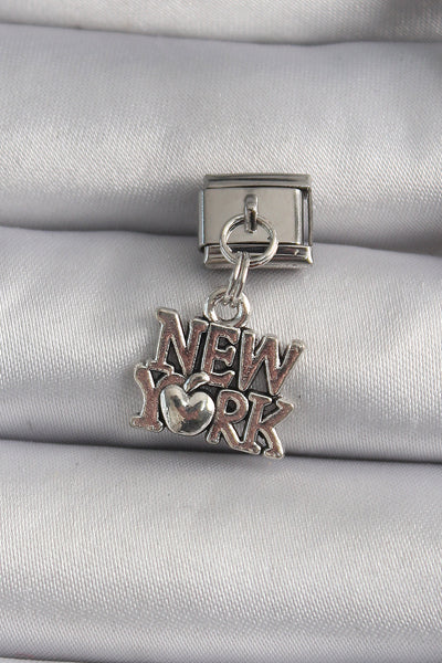 316L Çelik Gümüş Renk Sallantı New York Yazı Model Nomination Charm TG27BC1120