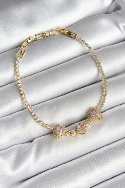 Pirinç Sıralı Pembe Kalp Figürlü Zirkon Taşlı Gold Renk Kadın Bileklik TG27BB6983