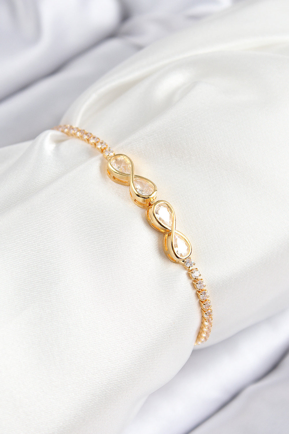 Pirinç Zirkon Taşlı Sonsuzluk Model Gold Renk Asansörlü Kadın Bileklik TG27BB7721