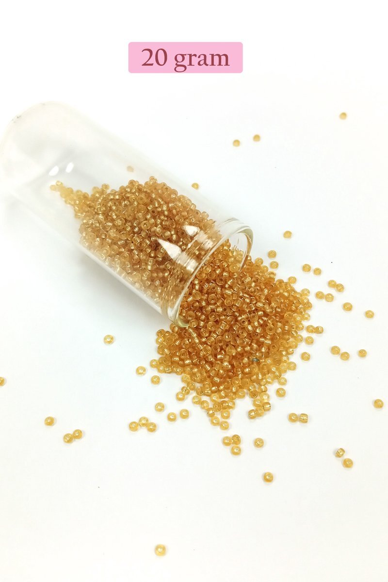Dökme Cam Kum Boncuk (11/0) 2 mm - 20 Gram - Şeffaf Altın - BNC027